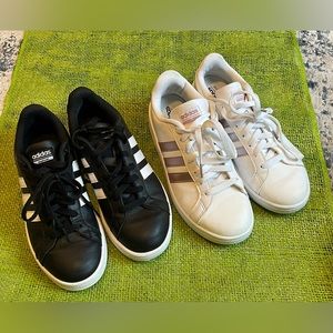 Two pair of Adidas women cloud foam- black pair and white pair size 9